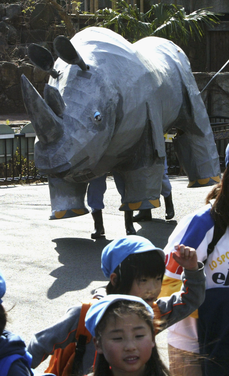 Illustration for article titled The Amazing World Of Zoo Drills, With Humans Dressed As Escaped Animals